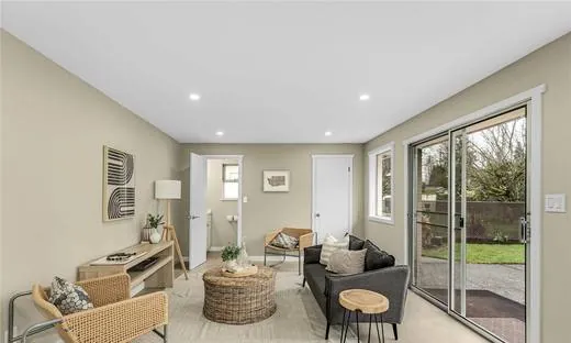 Living room with new flooring after a whole-home remodel